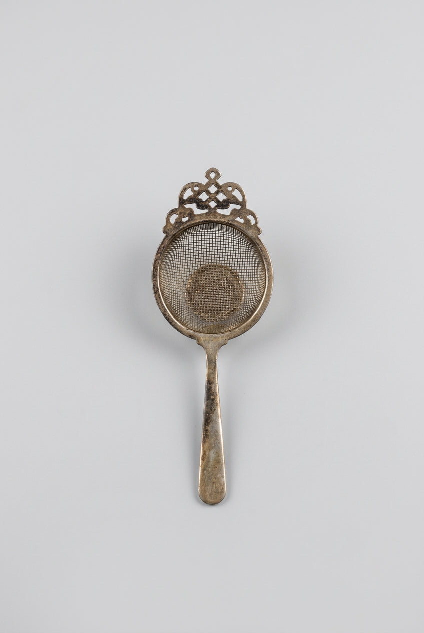 Ornate Patinated Tea Strainer