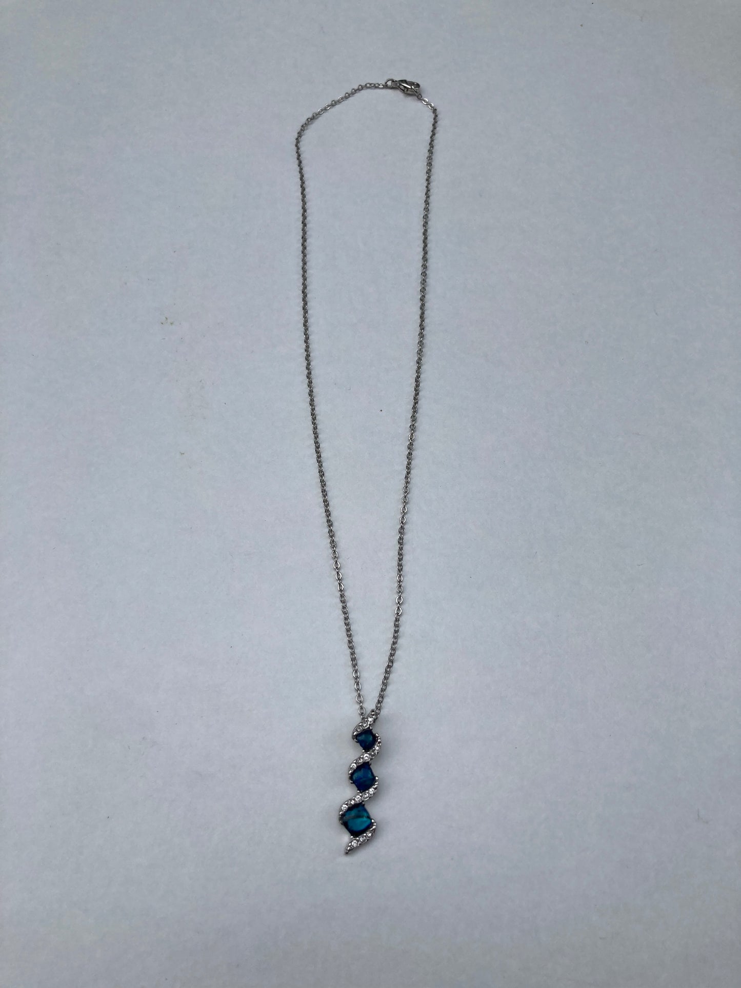 Blue and White Twist Set in Silver Pendant Necklace